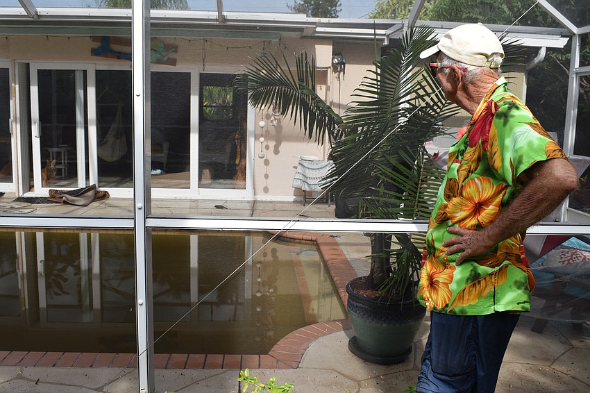 The stormwater from Eta caused Fred Kagi's pool to overflow. The water flooded Kagi's home.