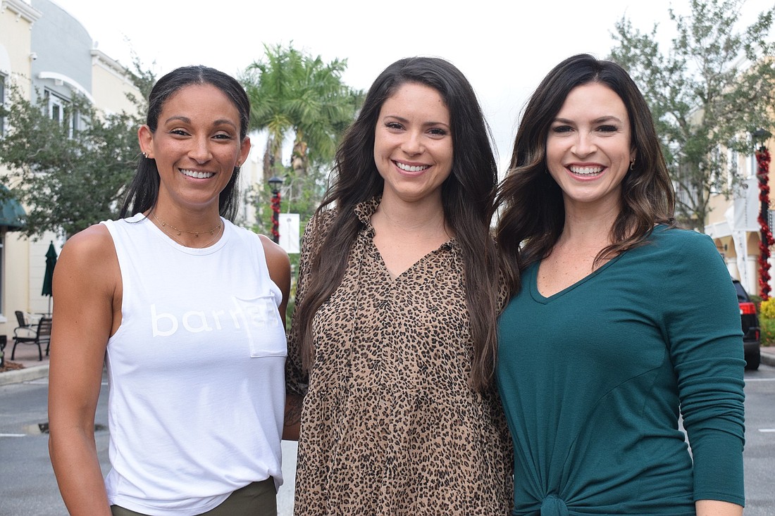 Nikki Roenicke, the owner of barre3, Lindsay Wood, the owner of Blossom & Burn Co., and Kati Ramage, the owner of Abide Designs Interiors, are organizing the first Small Biz Holiday Market on Main Street at Lakewood Ranch.