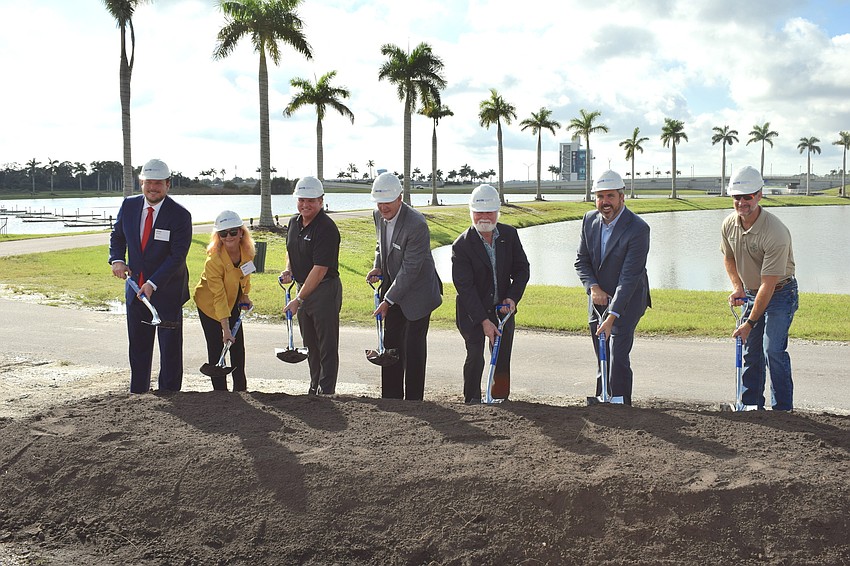 Rep. James Buchanan, Manatee Commissioner Vanessa Baugh, Sarasota Commissioner Mike Moran, Mote's Sam Seider and Michael Crosby,  Sen. Joe Gruters and Congressman Greg Steube break ground for the aquarium.