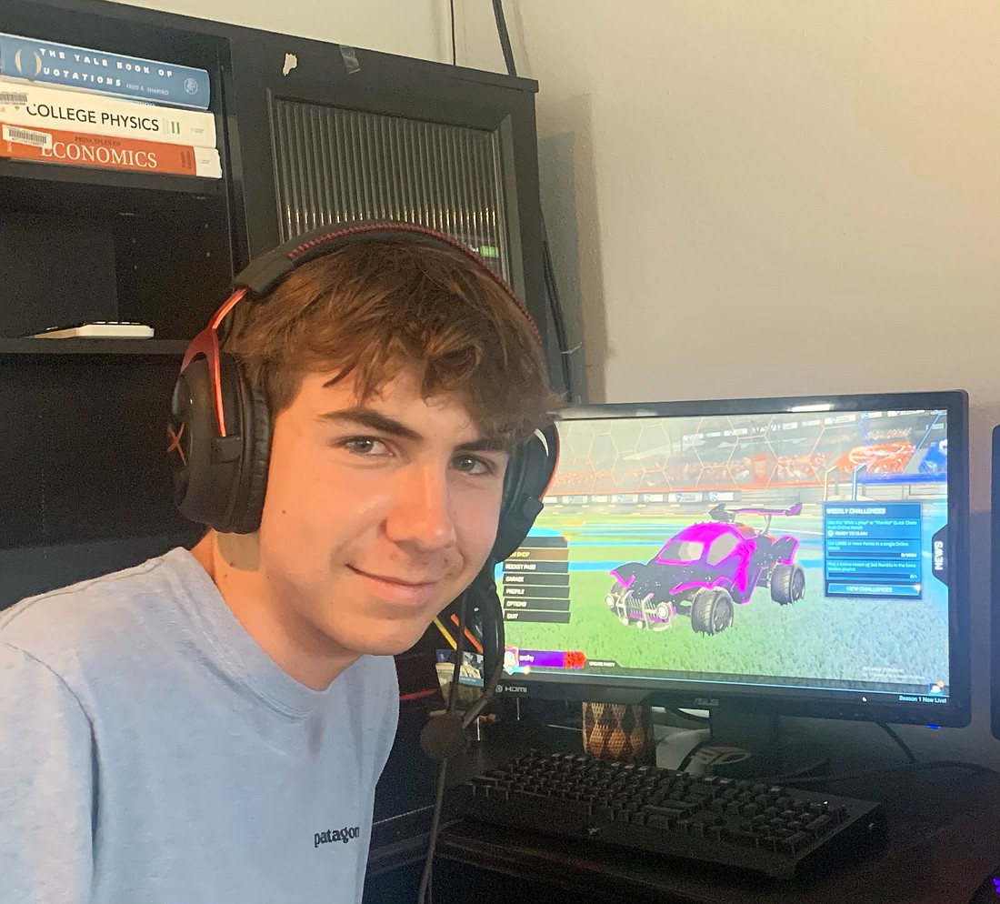 James Archibald, a senior at Lakewood Ranch High School, gets ready to play Rocket League from home.