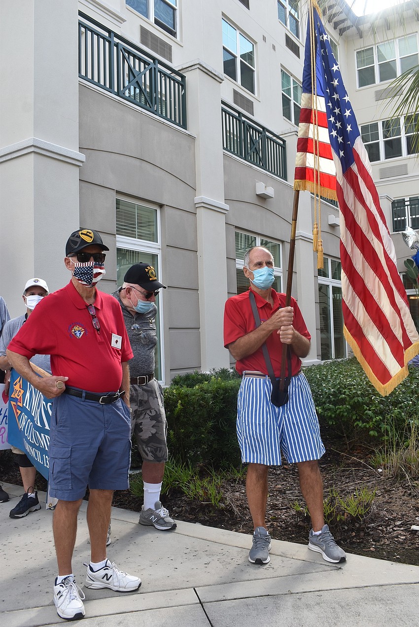 (From left)12-year National Guard veteran Tom Rokosz, 3-year Army veteran Tom Ludwig, 41-year Army veteran Rich Macklin and Knights of Columbus member Richard Kuebel prepare to march around The Sheridan at Lakewood Ranch.