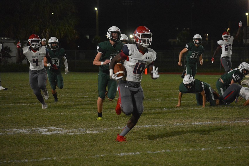 Manatee's Irone Jackson, a Central Michigan commit, takes the opening kickoff for a touchdown.