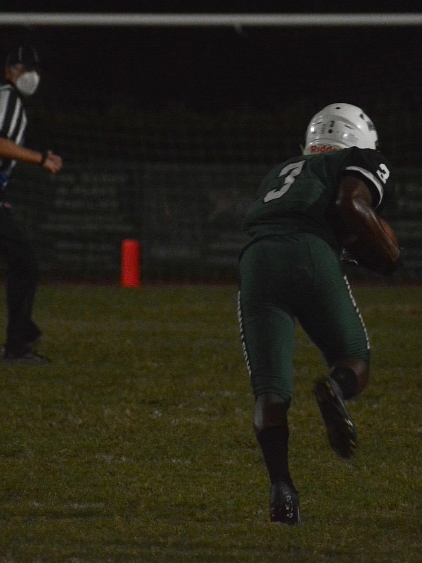 Lakewood Ranch wideout Emar'je Grace stumbles forward for a big gain.