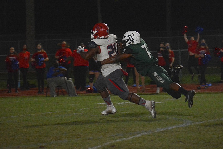 Lakewood Ranch senior Eli Daniels chases down Manatee's Kyree Jones to save a touchdown.