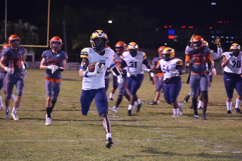Lehigh senior Tar'varish Dawson scores a touchdown on a 15-yard rush to give the Lightning a 7-0 lead. Dawson scored three touchdowns.