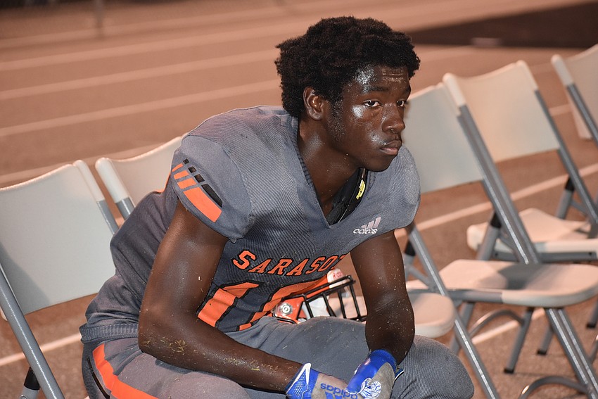 Sarasota junior T.J. McKay takes a seat after Lehigh scored a touchdown to take a 28-14 lead.