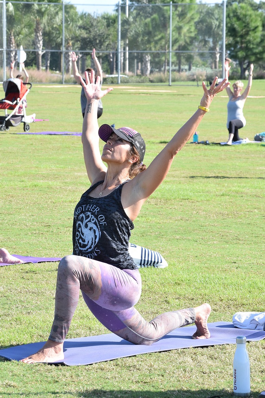 The Isles' Andrea Rutsky enjoys doing yoga at the Mindful Triathlon.