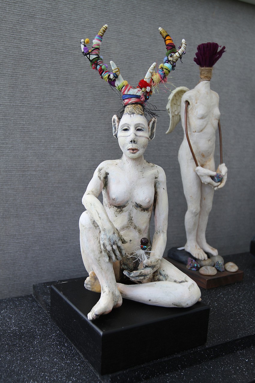 Su Griggs Allen specialized in ceramic and mixed art statues.