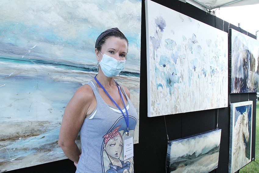 Christine Adele Moore showcased her mixed media paintings.