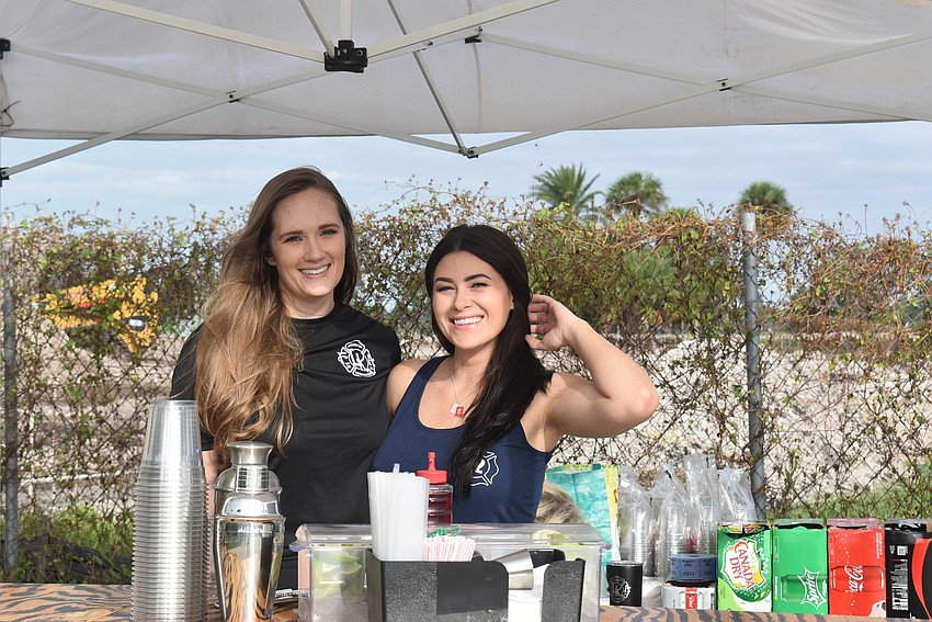 Tori Carr and Kaila Schield man the mid-course bar.