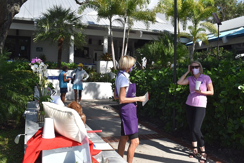 Sandy Keir and Jessica Hays cross paths before the golf started.