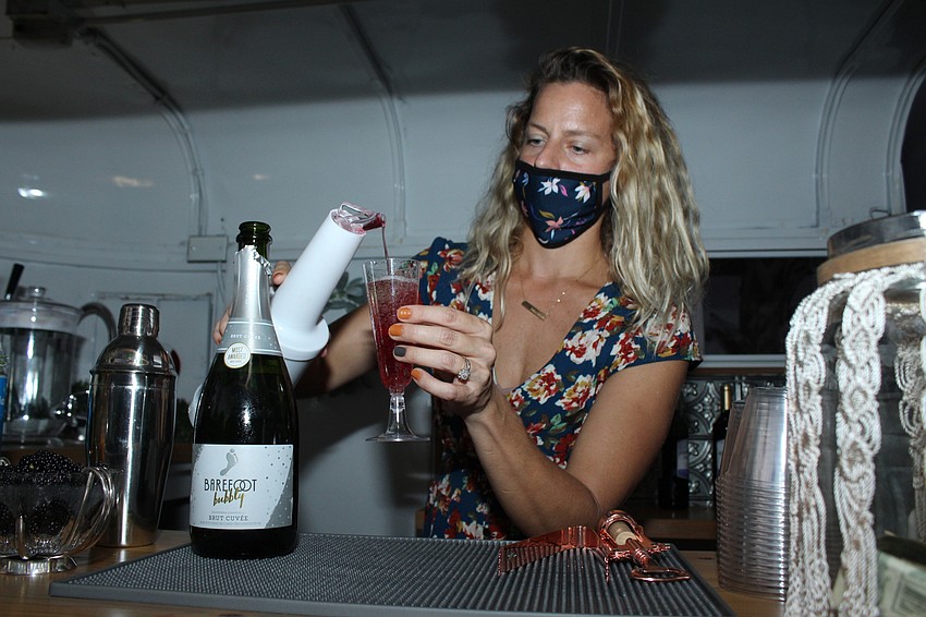 Jill Martini of the Wandering Whale served up drinks.