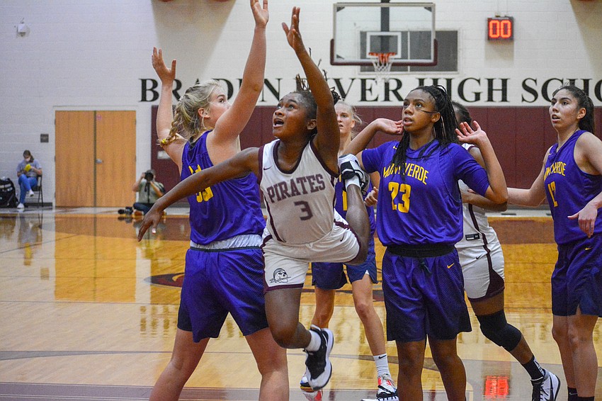 O'Mariah Gordon flies as she watches her floater from the lane. Gordon finished with a game-high 28 points.