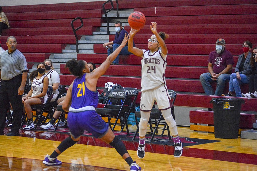 Cheyenne Stubbs sinks a three-pointer. Stubbs came back to the Pirates after two years with Sarasota High.