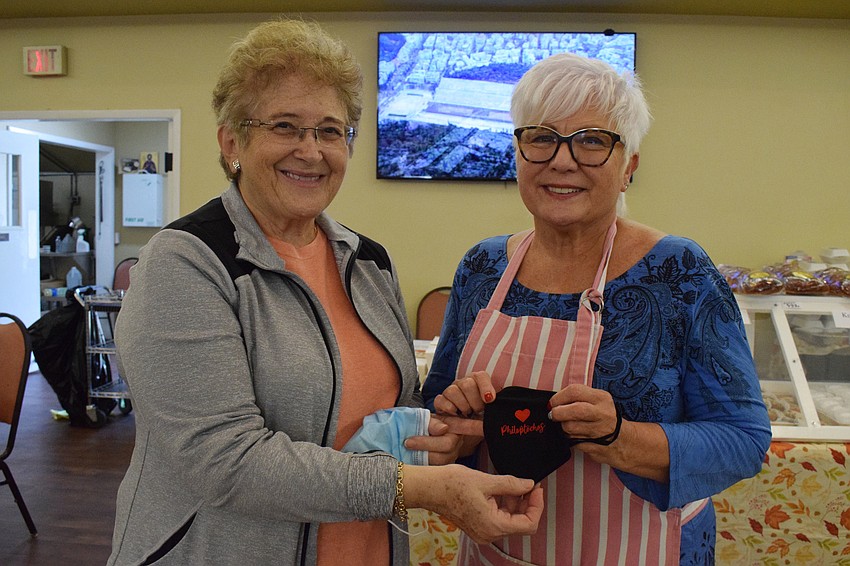 Maria Kirlangitis, the vice president of the St. Barbara Philoptochos, and Marilyn Blazakis, the president, look forward to the fellowship of the event as well as raising money for those in need.