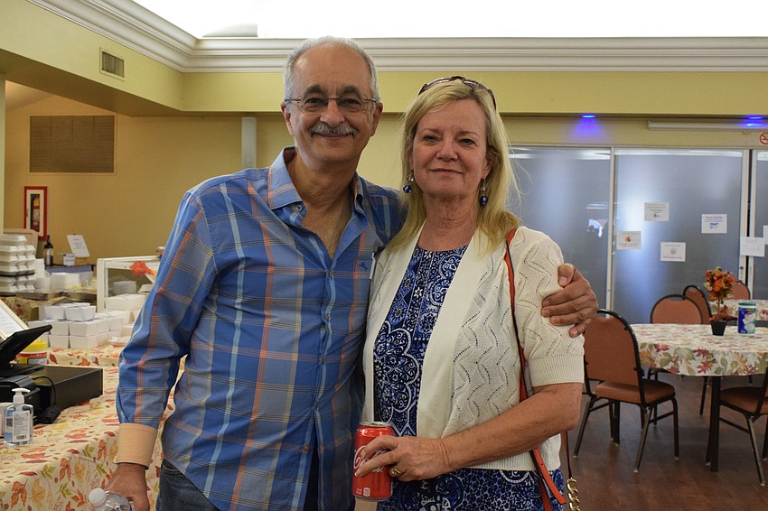 Del Webb's Tom and Michelle Bovis reminisce about their travels to Greece while attending the festival. 