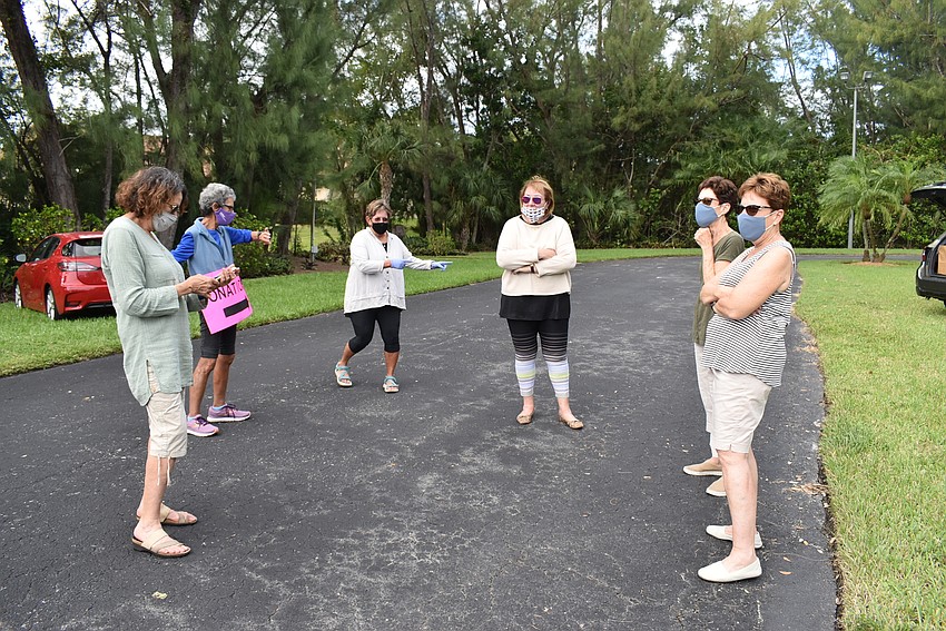 The women of the donation side social distance as they plan for their next event. Karen Gary, Max Spitzer, Judy Tobias, Maxine Tauber, Deborah Nyman and Carole Cohen.