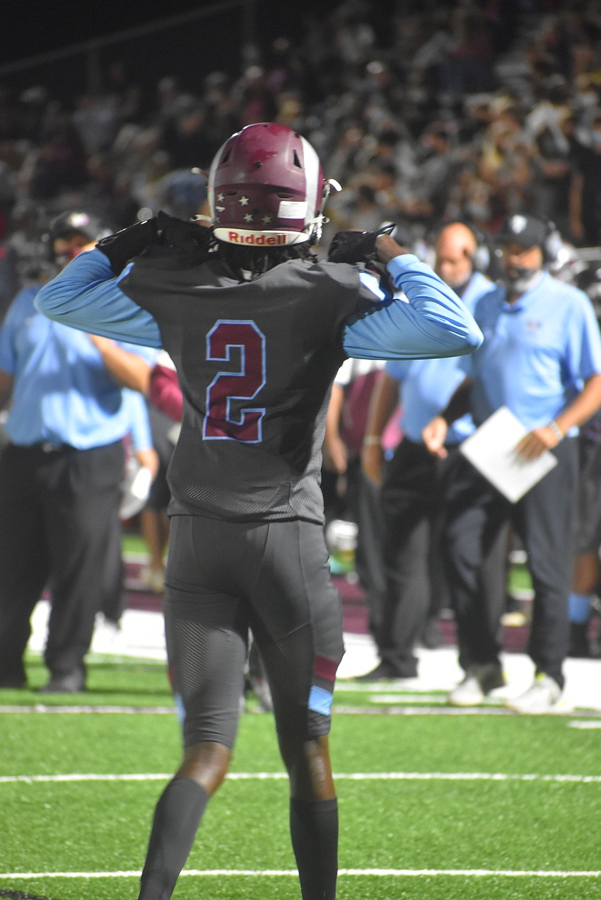 Riverview junior Duke Timmons flexes after watching quarterback Will Evans score his second rushing touchdown of the day to extend the lead to 13-0 late in the first half.