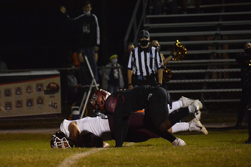 Logan Lipker lands cross the goal line for a receiving touchdown.