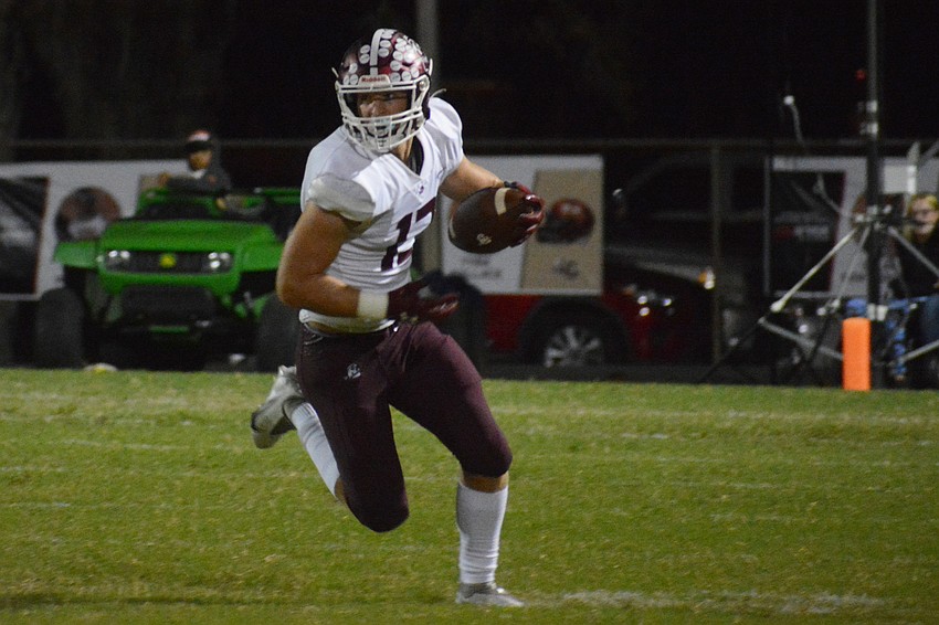 Carson GOda cuts upfield after catching a pass.