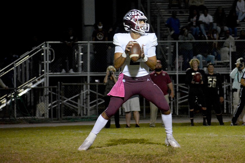 Pirates QB Shawqi Itraish looks for a receiver downfield. Itraish had three touchdown passes.