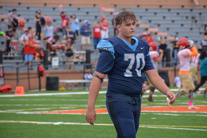 Senior lineman Michael Dyer walks off the field for the final time after ODA's loss to Bishop Snyder.