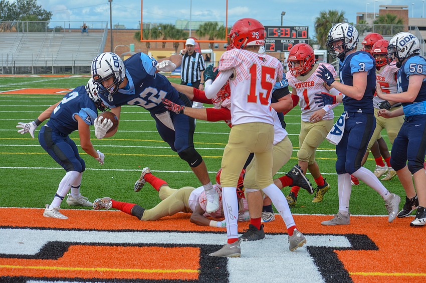 ODA senior Nolan Lewellen dives into the end zone.