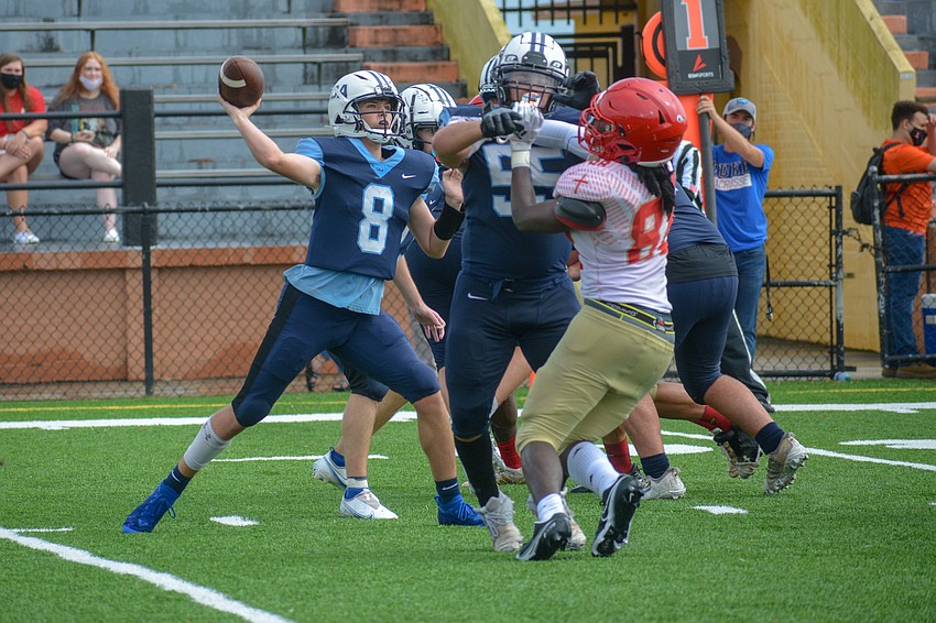 ODA senior QB Patrick O'Keefe fires a pass to his right.