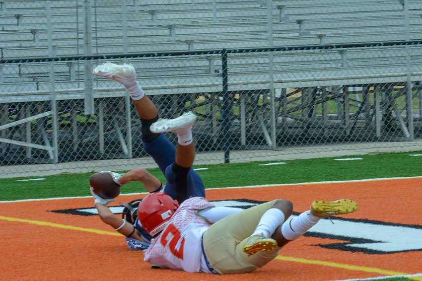 Nolan Lewellen hauls in a first-quarter touchdown pass.