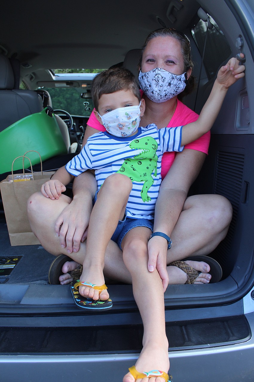 Jacob and MG Bernan sat in their car.
