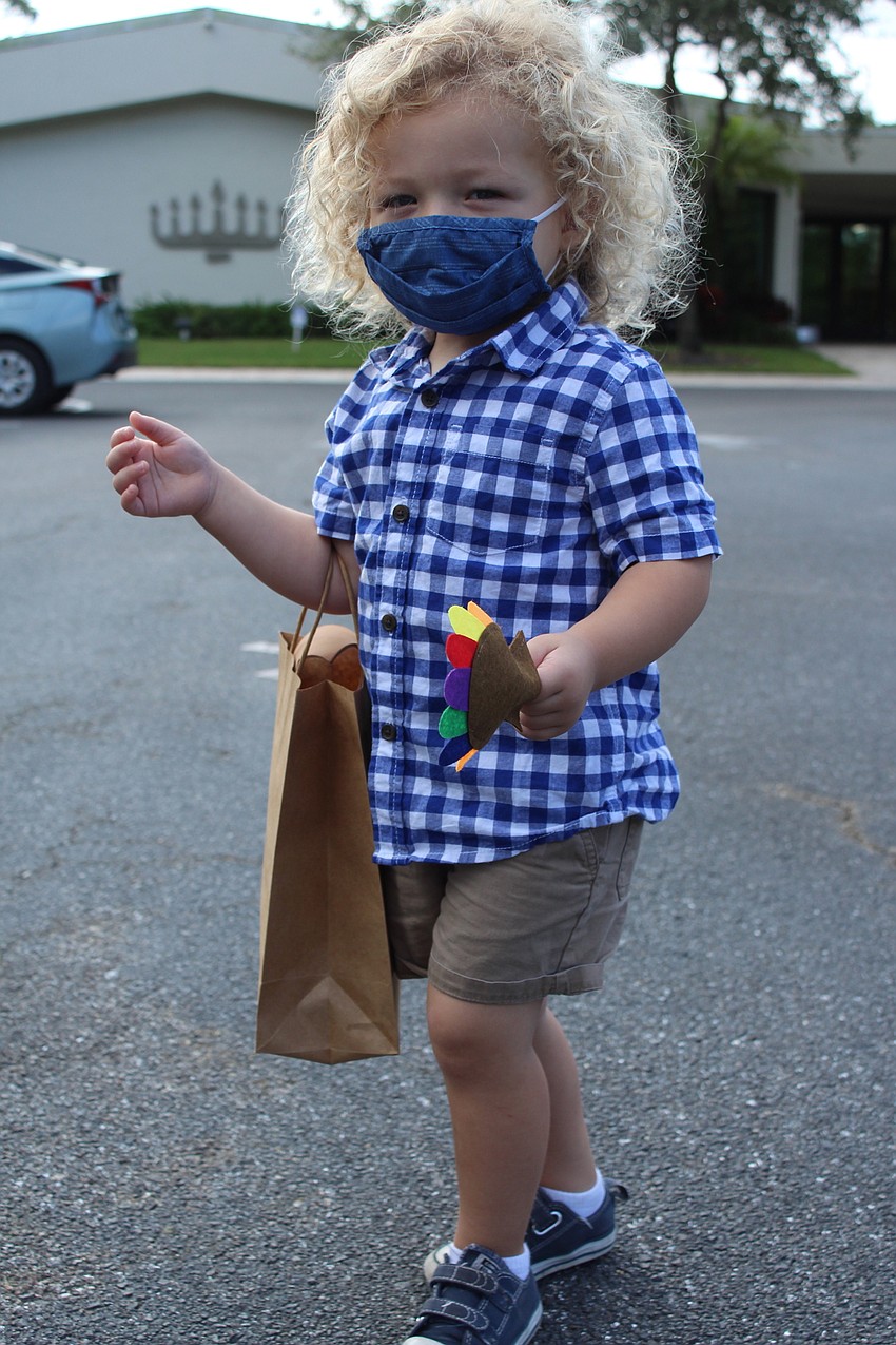 Brody Gates wandered around the parking lot.