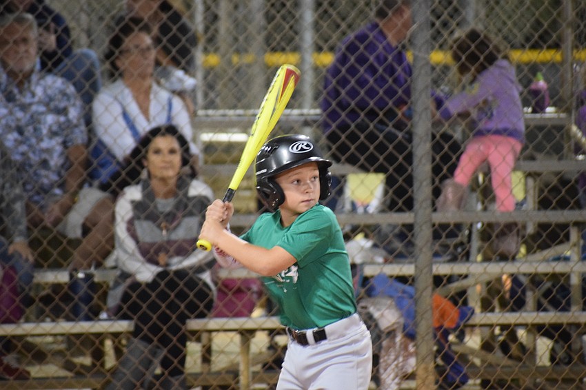 Jackson Lacy is all concentration at home plate.