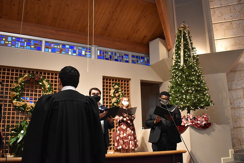 Michael Bodnyk led the choir of eight.