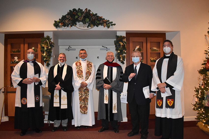 The Rev. Ken Blyth, the Rev. Brock Patterson, Father Robert Dziedziak, the Rev. Norman Pritchard, Rabbi Stephen Sniderman and Father Dave Marshall