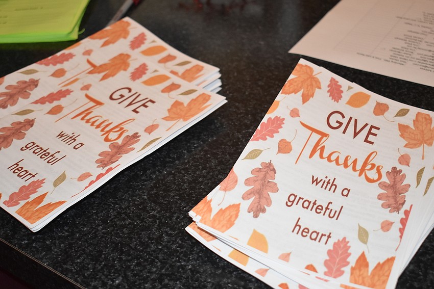 The programs were passed out as usual.