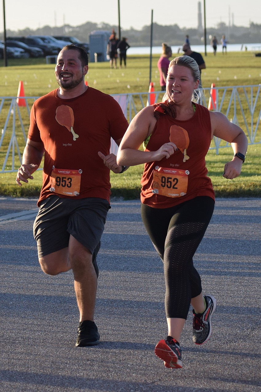 North Port's Mike Fuller and Jenna Marks, who are engaged, ran together. Fuller admits, 