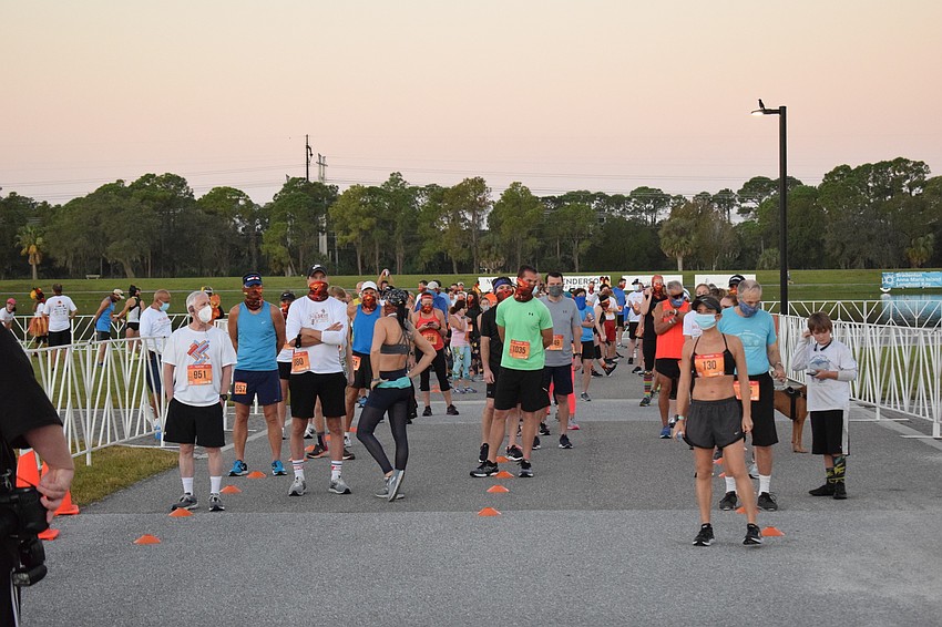 Runners were organized in three distinct lines before the start.