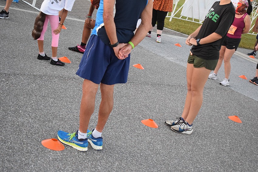 Little orange markers made sure runners kept their distance while lining up.