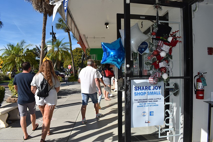 Balloons and plenty of signs welcomed small business shoppers into Just/Because.