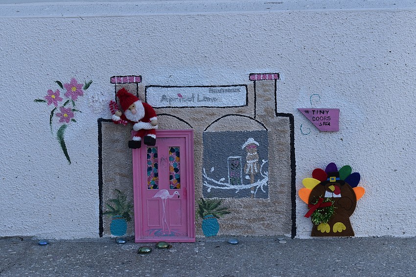 Shop small or small shop? Apricot Boutique had a miniature version of itself just outside. The tiny shop got into the spirit too.