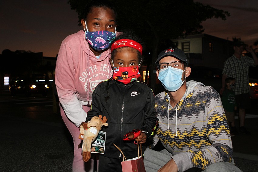 Ebonie Hadley picked up gifts with Eric Guevarez Jr. and  Eric Guevarez the Third.