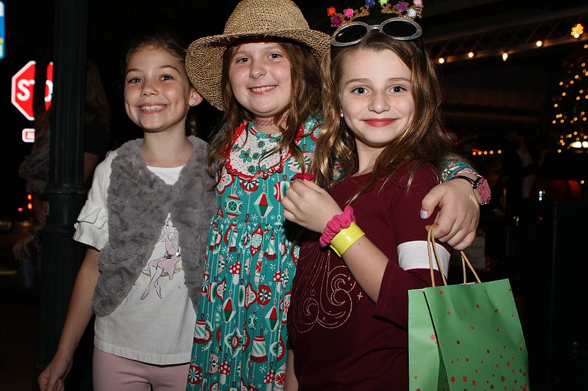 Fiona Quinto Hart, Olive Schomburg and Francesca DiSilvio picked up gift bags.