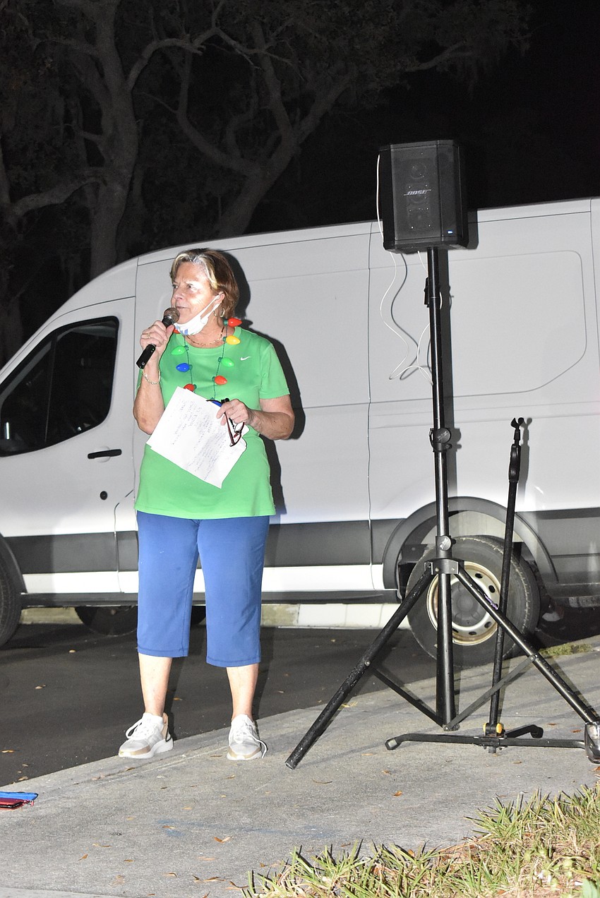 Gail Loefgren kicks off the tree lighting ceremony.