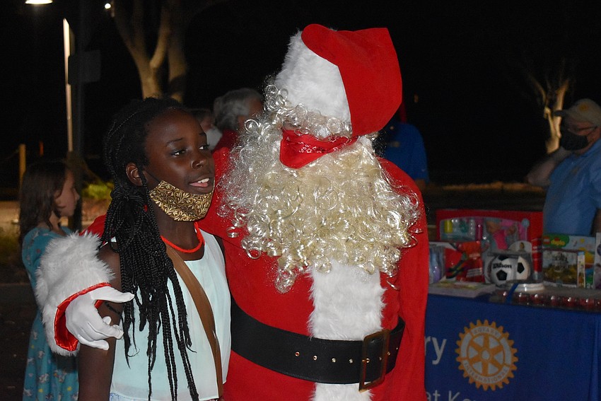 Makena M'Mwirichia chats with Santa.