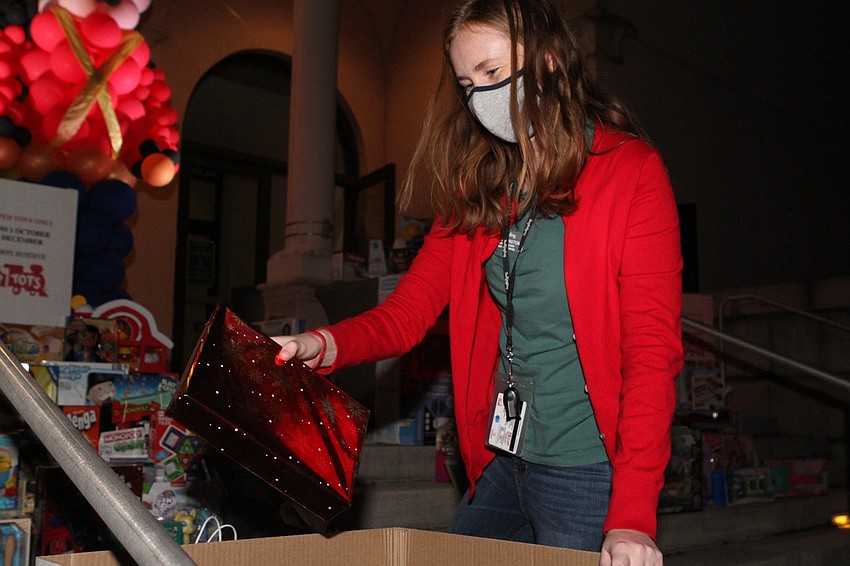 Kay Carrington picked up presents.