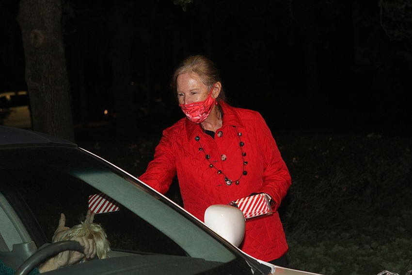 Sharon Freddes handed out coupons for people's next Ringling visits.