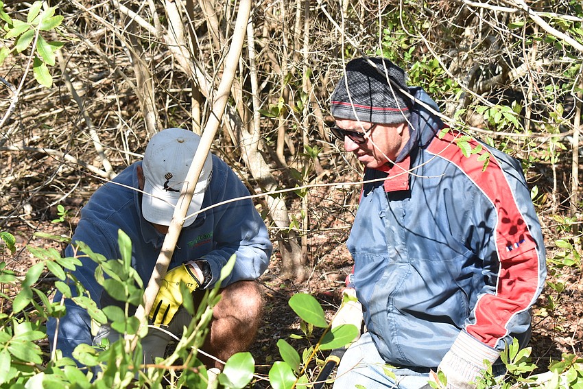 March 12: Tim Thurman and Joe McClash work on the Sister Keys.