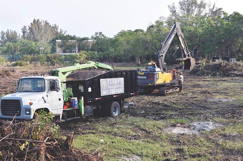 April 16: Work crews in early April began clearing land for the Town Center project.