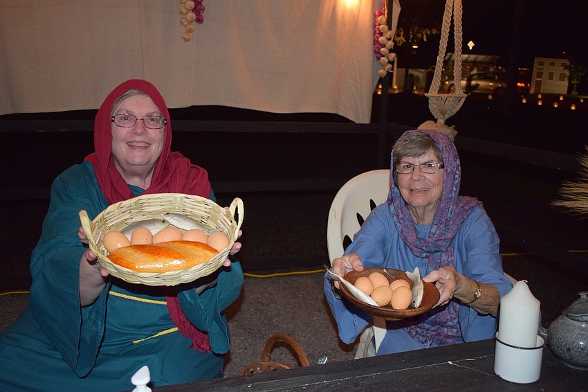 Anyone looking for food can visit Jean Ard and Nancy Robb. They're selling fish, eggs and bread.