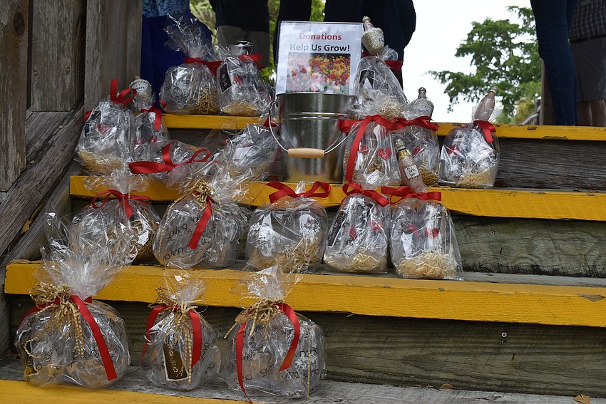 The club was selling Longboat Key Garden Club acrylic wine glasses.